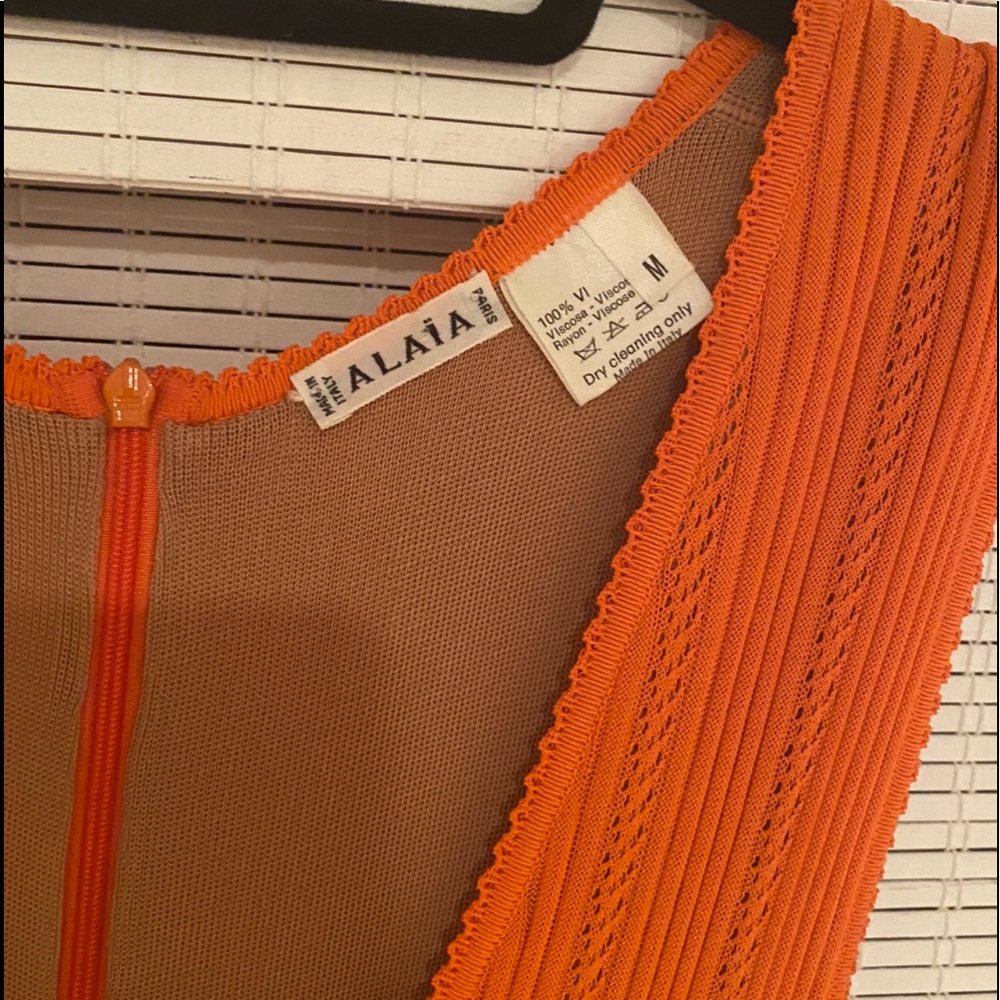 Alaïa orange sleeveless knit mini dress paid $4,084 size M